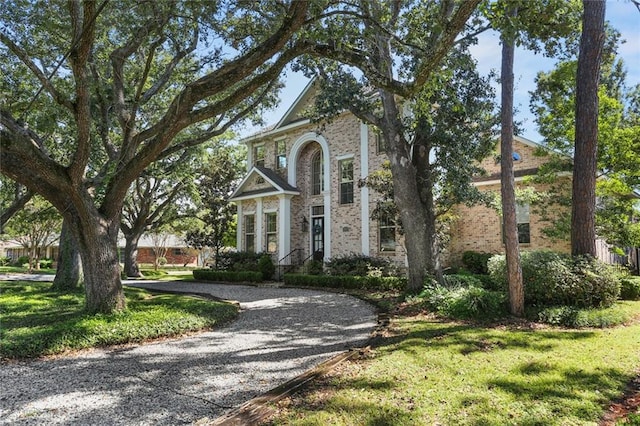 view of front of home with a front lawn