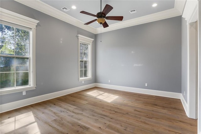 unfurnished room featuring crown molding, hardwood / wood-style flooring, and ceiling fan