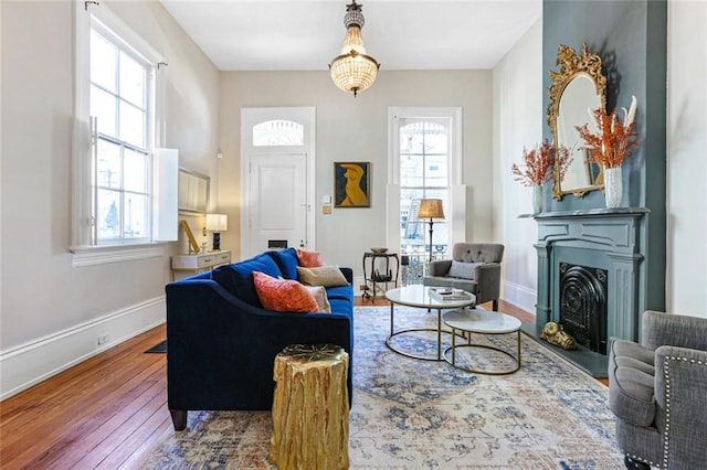 living area with hardwood / wood-style floors