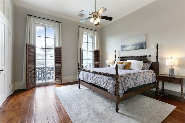 bedroom featuring ornamental molding, access to outside, ceiling fan, and dark wood-type flooring