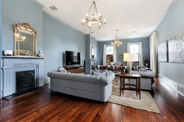 living room featuring dark hardwood / wood-style floors and ornamental molding