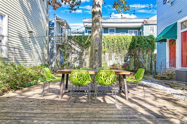 exterior space with central AC and a wooden deck