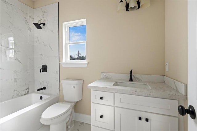 full bathroom with tiled shower / bath combo, vanity, and toilet