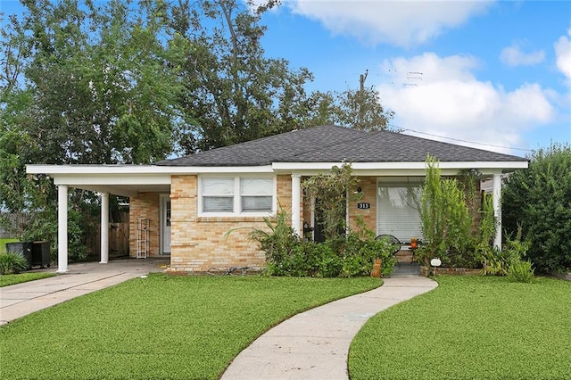 single story home with a carport and a front yard