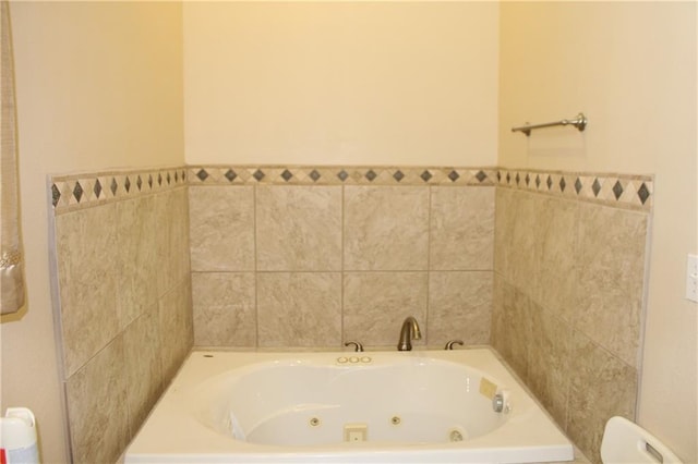 bathroom with a tub to relax in