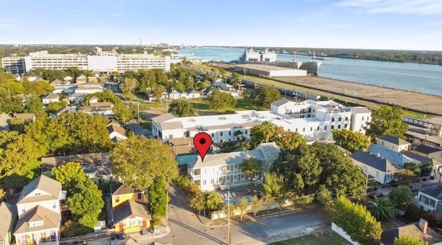 birds eye view of property featuring a water view