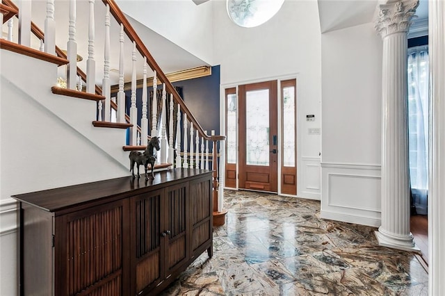 foyer entrance with ornate columns