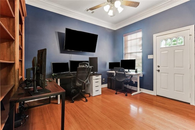 office space featuring hardwood / wood-style flooring, crown molding, and ceiling fan