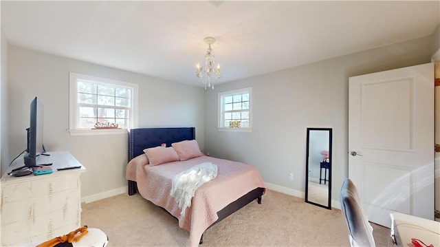 carpeted bedroom with a notable chandelier and multiple windows