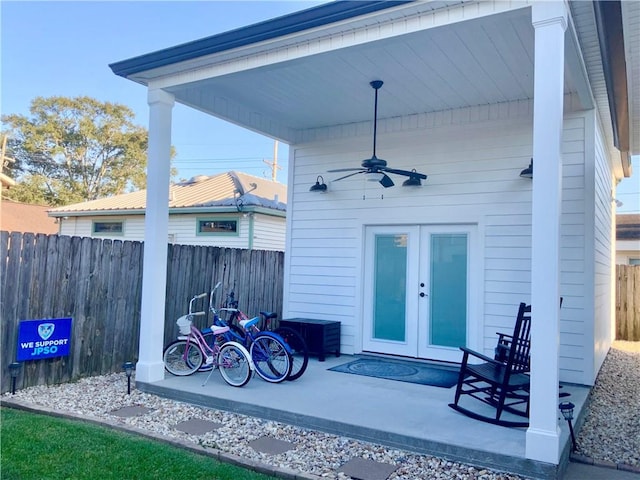 exterior space with ceiling fan and french doors