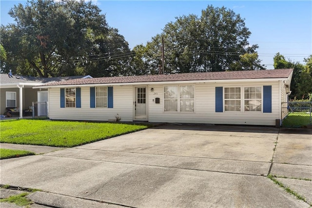 ranch-style house with a front lawn