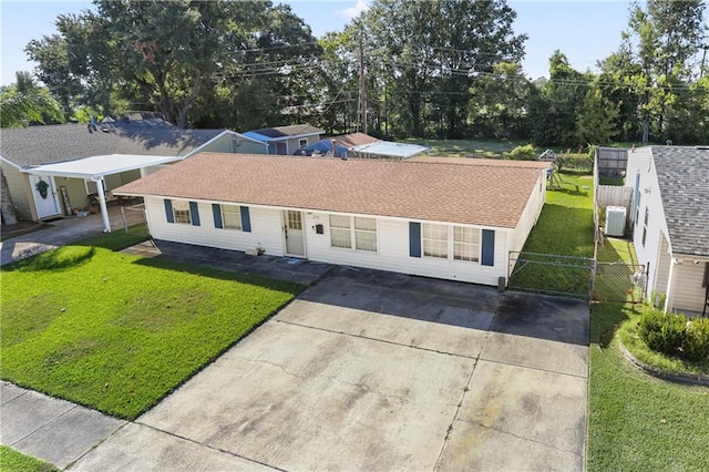 single story home with a front yard and central AC