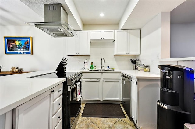 kitchen featuring extractor fan, white cabinets, sink, and electric range