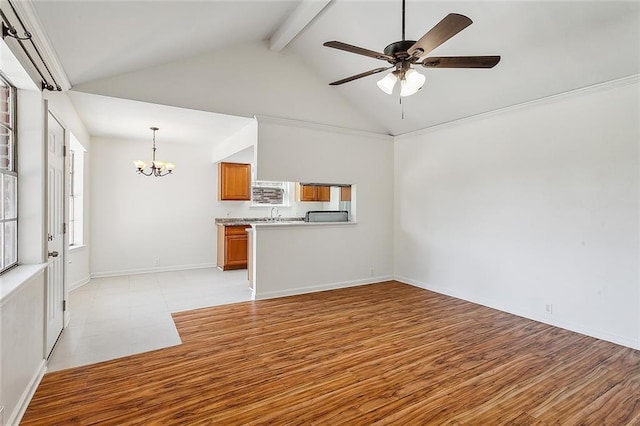 unfurnished living room featuring high vaulted ceiling, ceiling fan with notable chandelier, sink, light hardwood / wood-style flooring, and beamed ceiling