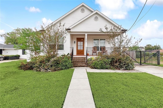 bungalow-style house with a porch and a front yard