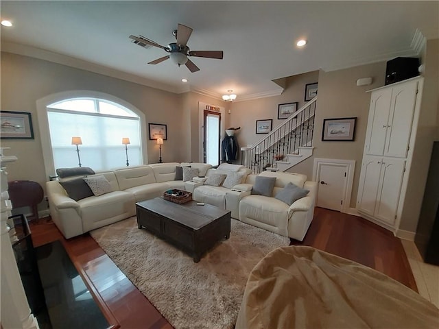 living room with ornamental molding, ceiling fan, and hardwood / wood-style floors