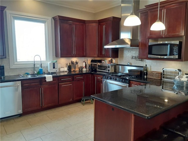 kitchen with pendant lighting, backsplash, wall chimney range hood, appliances with stainless steel finishes, and dark stone counters