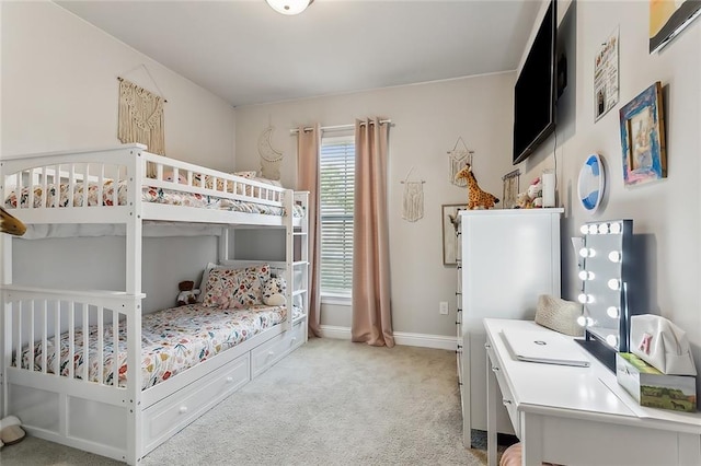 bedroom with light colored carpet