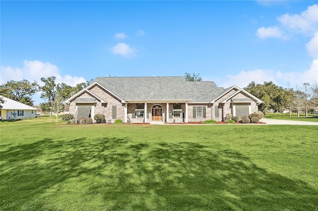 view of front of home featuring a front yard and covered porch