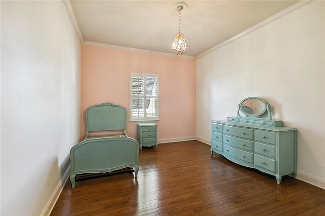 sitting room with a notable chandelier, dark hardwood / wood-style floors, and crown molding