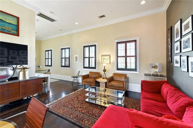 living room with crown molding and dark wood-type flooring