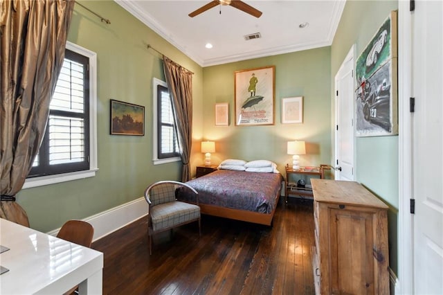 bedroom featuring ceiling fan, dark hardwood / wood-style floors, and crown molding