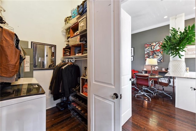 walk in closet with dark hardwood / wood-style flooring