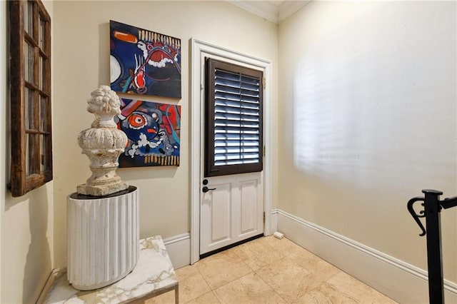 doorway to outside featuring crown molding