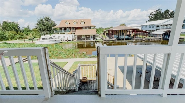 view of gate with a water view