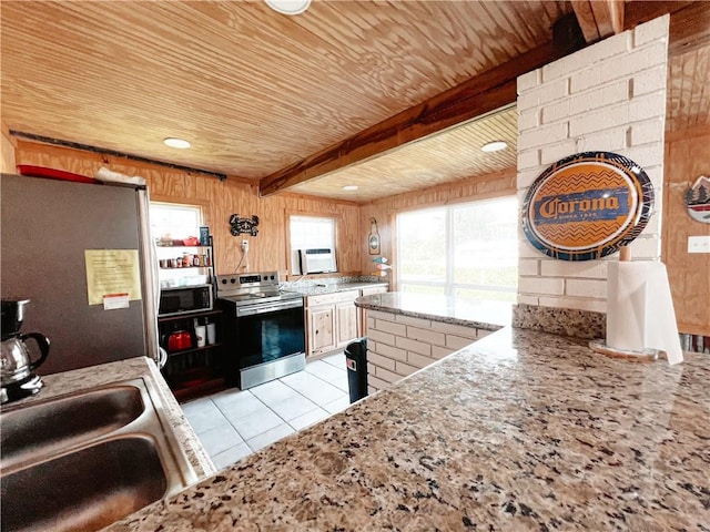 kitchen featuring light tile patterned flooring, beam ceiling, wood ceiling, sink, and stainless steel appliances