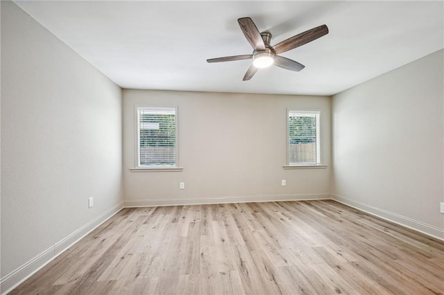 unfurnished room featuring ceiling fan and light hardwood / wood-style flooring