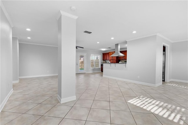 unfurnished living room with crown molding and light tile patterned flooring