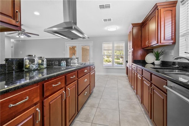 kitchen with dishwasher, dark stone counters, sink, wall chimney exhaust hood, and black electric cooktop