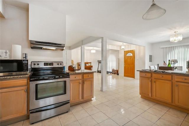 kitchen with hanging light fixtures, light tile patterned floors, a chandelier, extractor fan, and stainless steel appliances