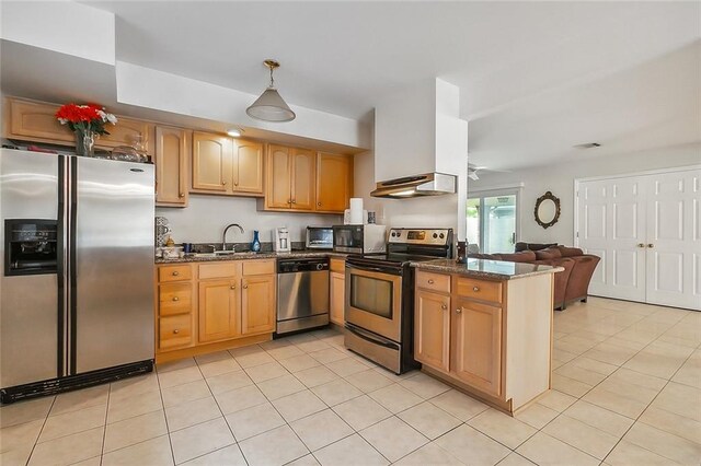 kitchen with stainless steel appliances, dark stone countertops, ventilation hood, sink, and light tile patterned flooring