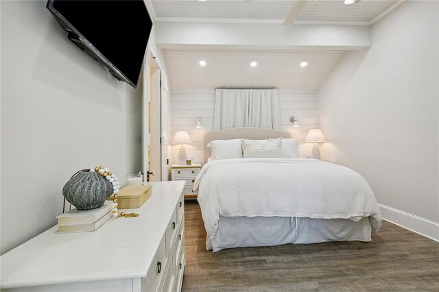 bedroom with lofted ceiling, wood ceiling, and dark hardwood / wood-style flooring