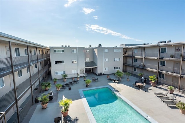 view of pool featuring a patio area