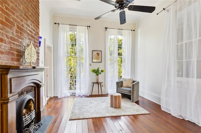 unfurnished room with hardwood / wood-style floors, ceiling fan, and ornamental molding