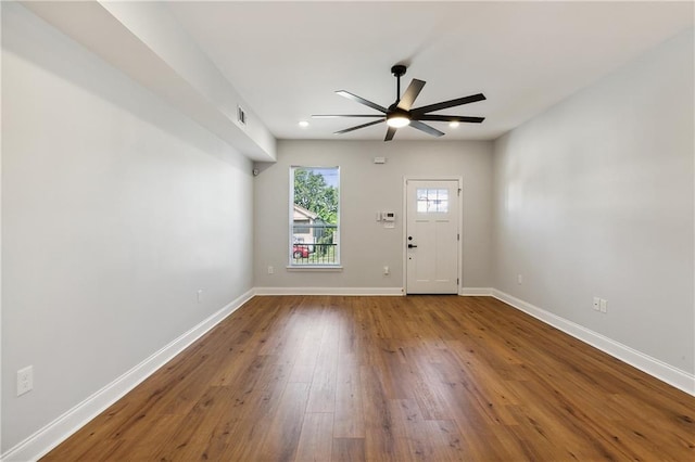 interior space with hardwood / wood-style flooring and ceiling fan