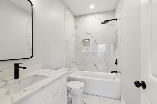 full bathroom featuring tiled shower / bath combo, vanity, and toilet