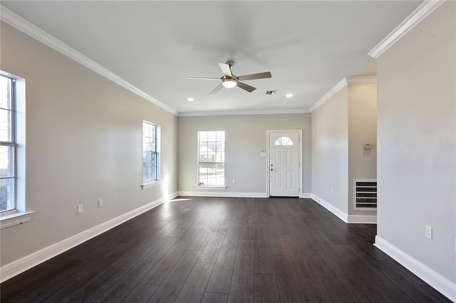 foyer with ornamental molding, ceiling fan, and dark hardwood / wood-style floors