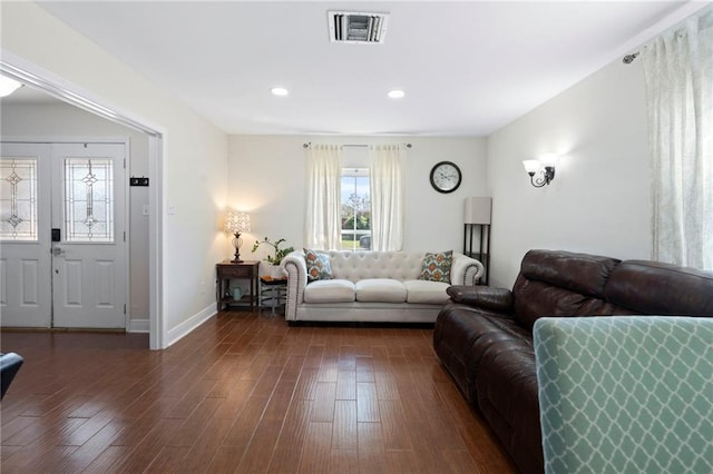 living room with dark hardwood / wood-style floors