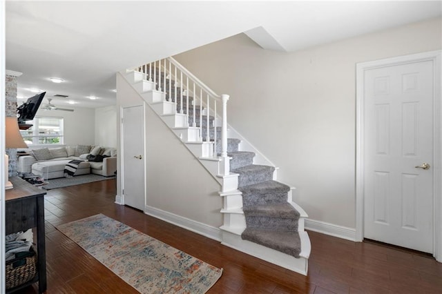 stairway featuring hardwood / wood-style flooring