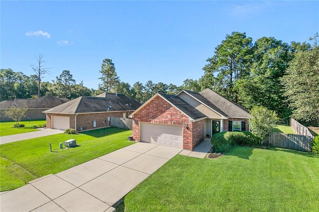 ranch-style house featuring a front yard and a garage