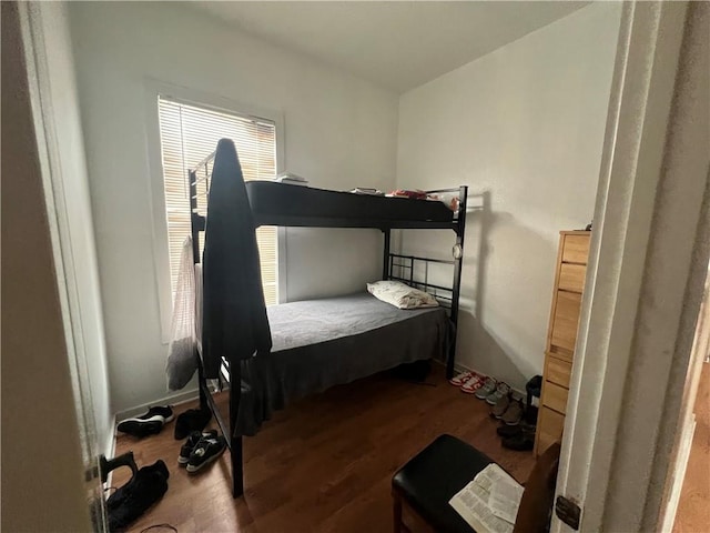 bedroom with hardwood / wood-style floors