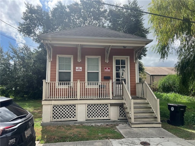 bungalow-style home featuring covered porch