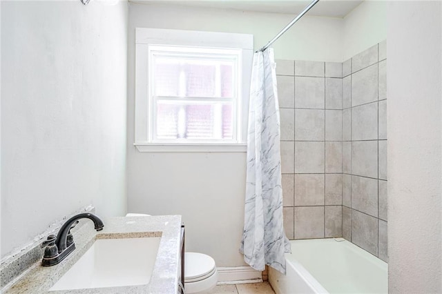 full bathroom with shower / bath combination with curtain, vanity, and toilet