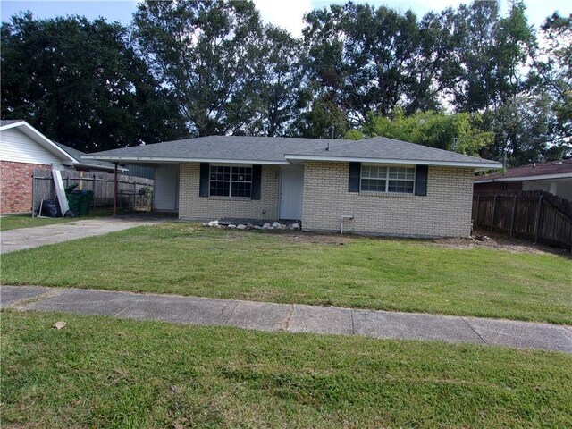 3756 Riviera Dr, Slidell, LA 70458 - ranch-style house with a front lawn