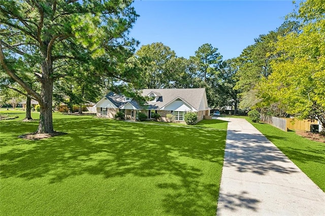 view of front of home with a front yard