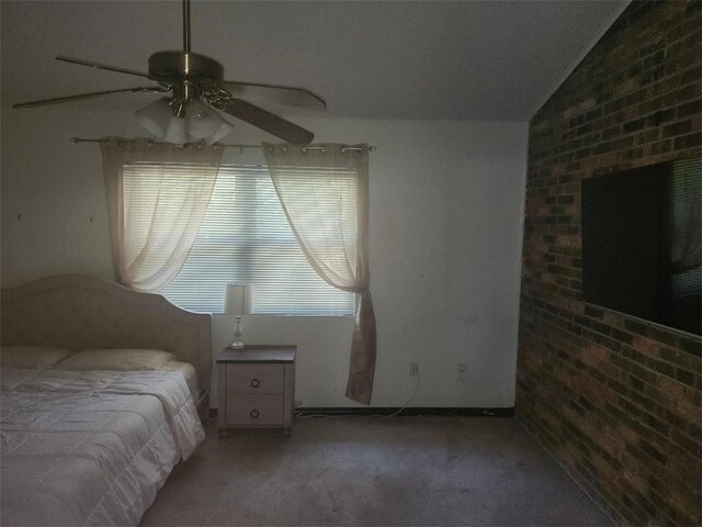 336 Indian Village Rd Unit 7, Slidell, LA 70461 - unfurnished bedroom with lofted ceiling, brick wall, carpet, and ceiling fan